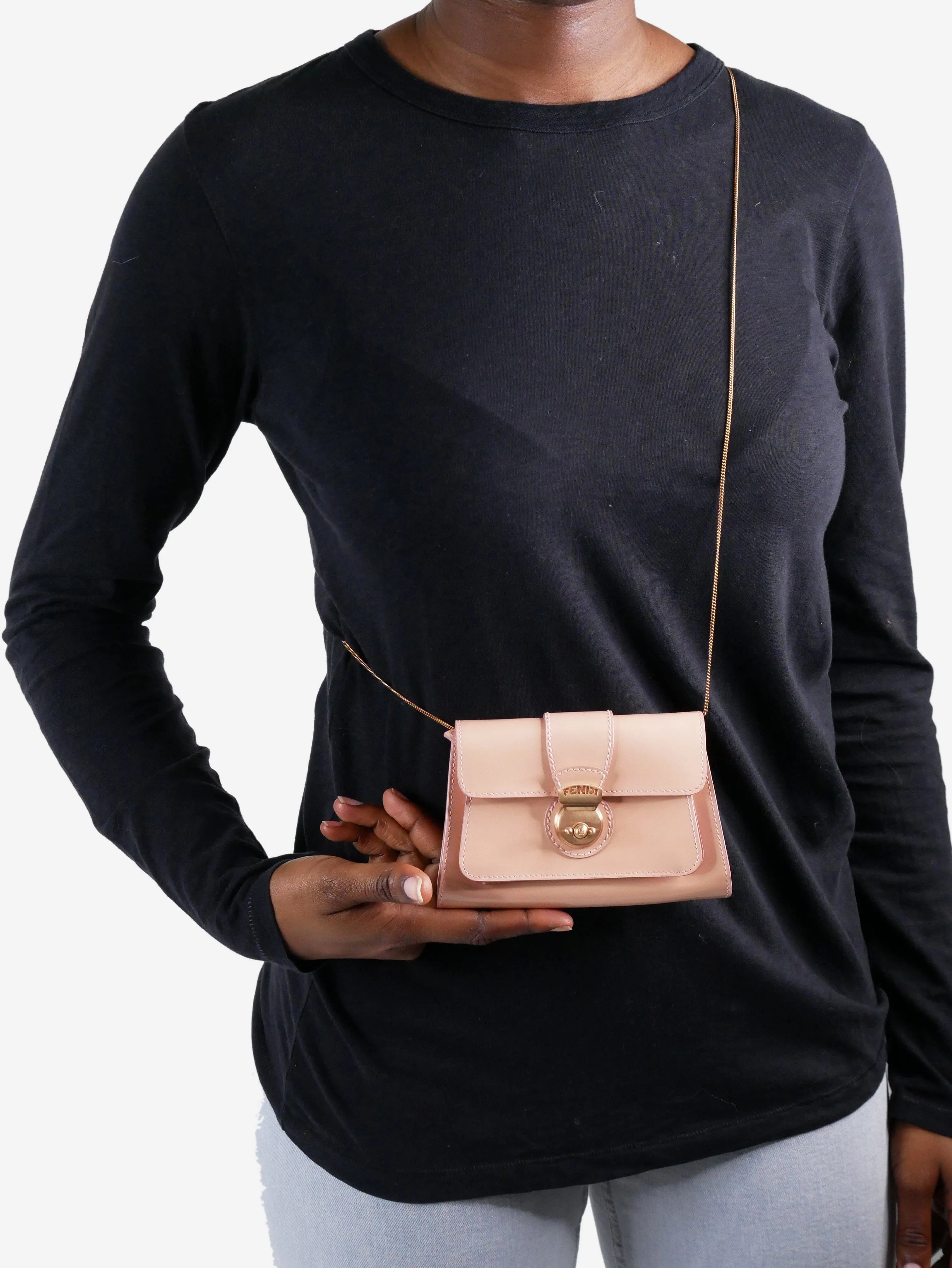 Pink wallet on chain bag